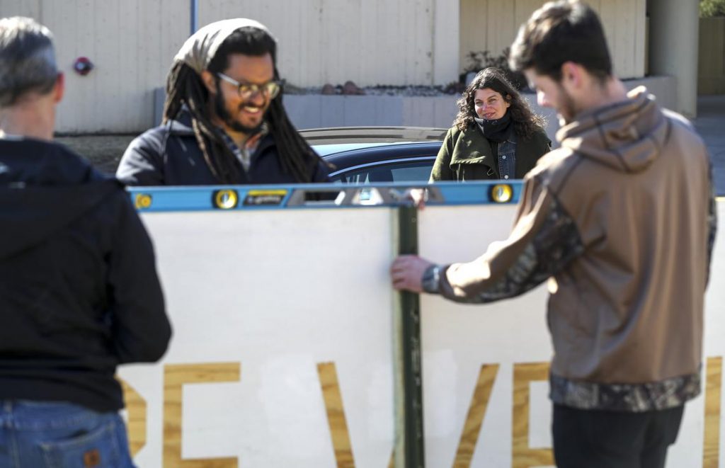 Duluth Street Art Initiative pays tribute to health care workers with sign perched in front of St. Luke's – Duluth News Tribune